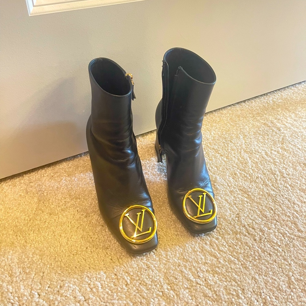 Black LV womens boots.